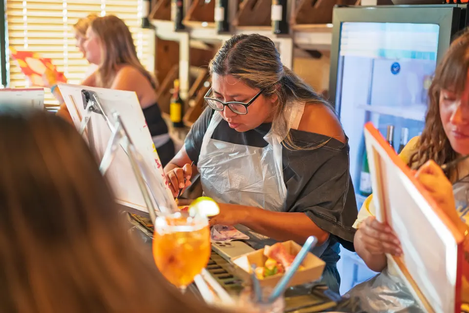 Photo 77 of 128, painting Aperol Spritz at Cork & Tap
