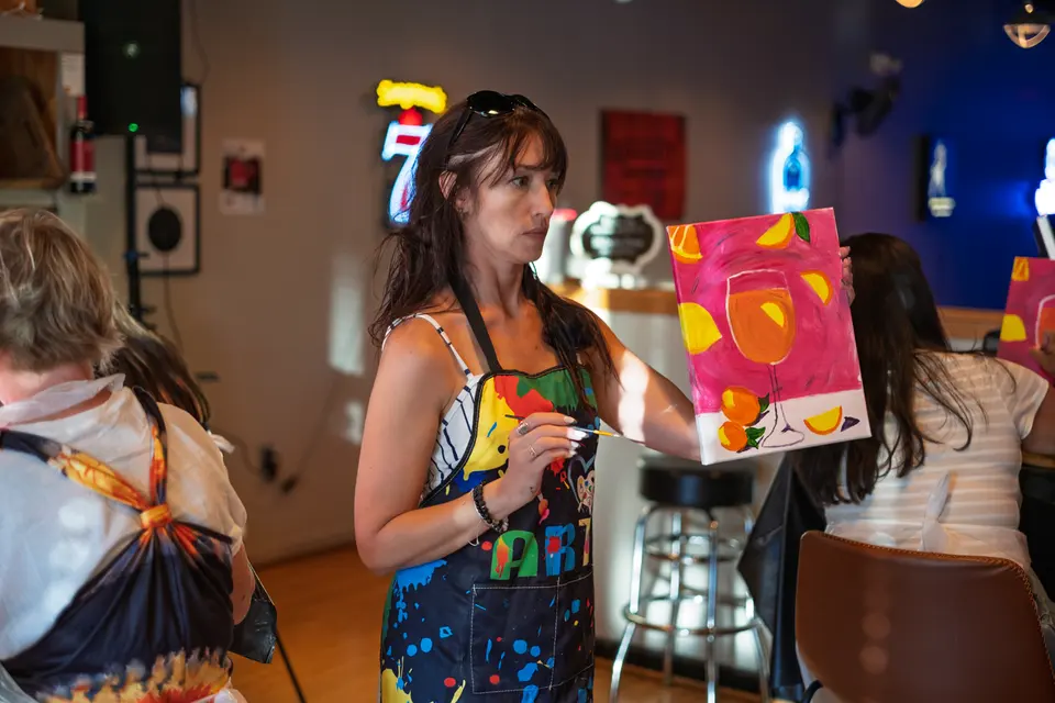 Photo 101 of 128, painting Aperol Spritz at Cork & Tap