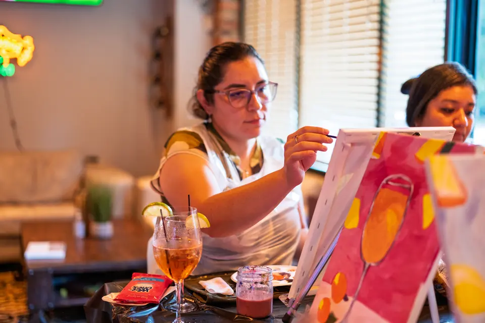 Photo 119 of 128, painting Aperol Spritz at Cork & Tap