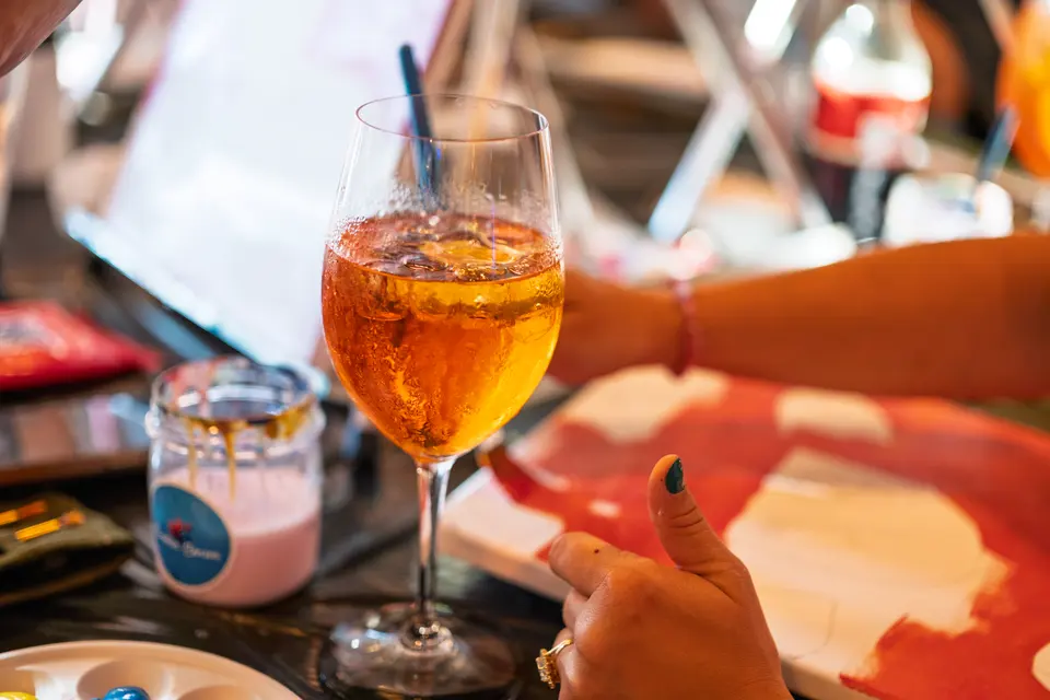 Photo 24 of 128, painting Aperol Spritz at Cork & Tap