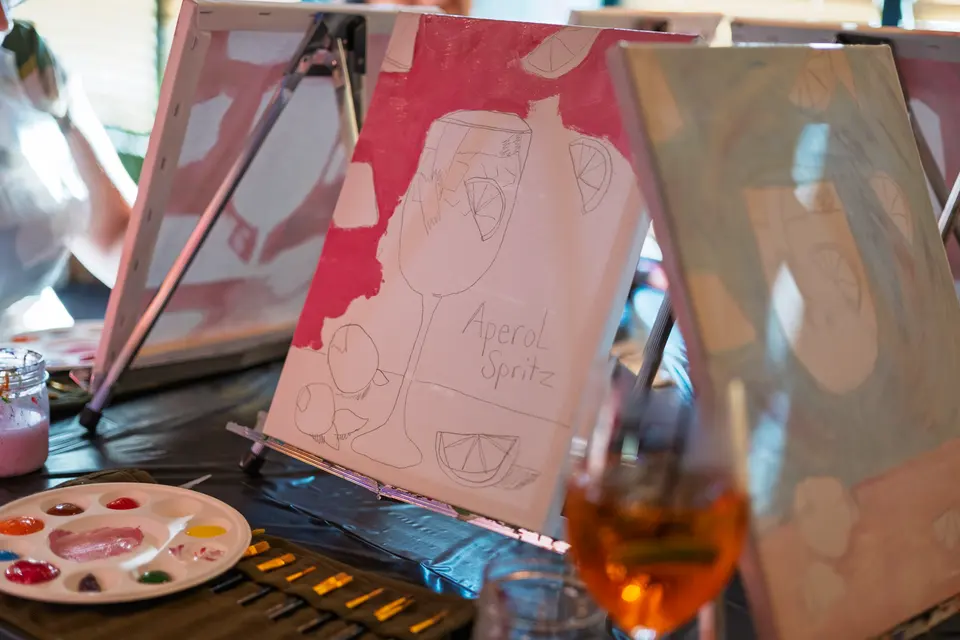 Photo 36 of 128, painting Aperol Spritz at Cork & Tap