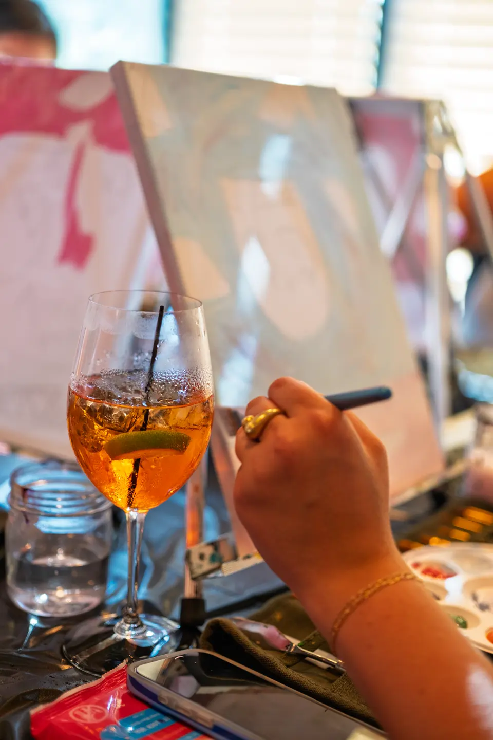 Photo 37 of 128, painting Aperol Spritz at Cork & Tap