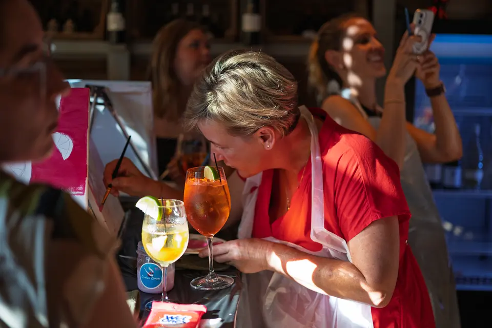 Photo 44 of 128, painting Aperol Spritz at Cork & Tap